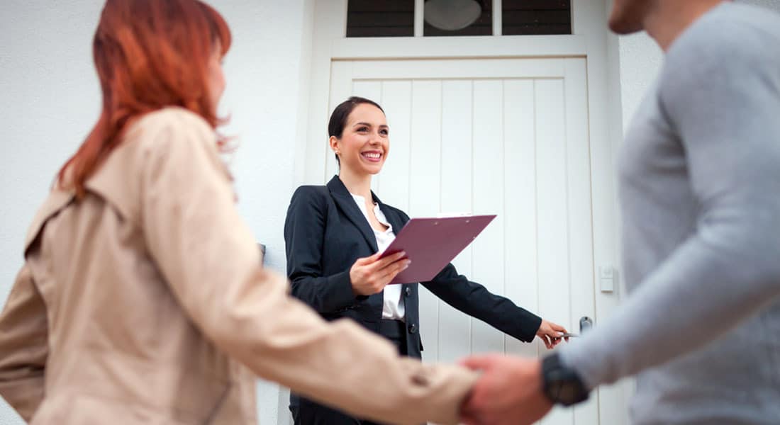 A real estate agent with an Open House sign-in sheet.